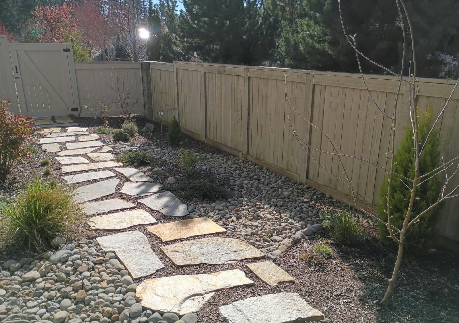 Flagstone path and river rock